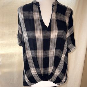 Black and white plaid top. High low waist line. Size XS